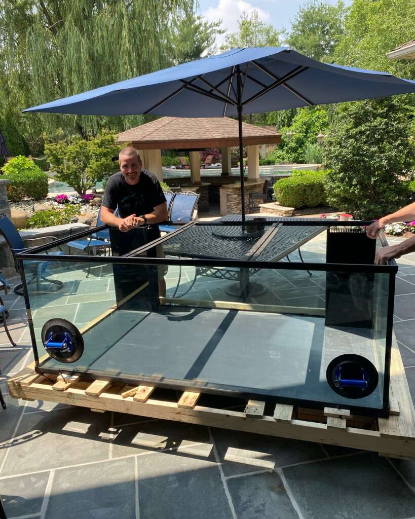 Summer installs a custom 700 gallon reef tank